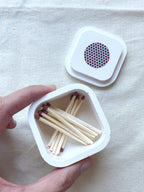 CAJA CON CERILLAS